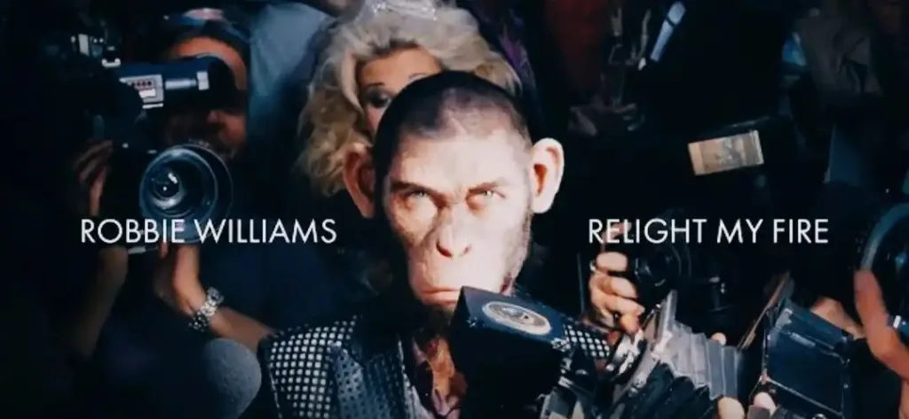 Relight My Fire Lyrics - Robbie Williams ft. Tom Bales & Adam Tucker